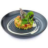 Salmon tartar with avocado, tomatoes, fresh ginger with wasabi