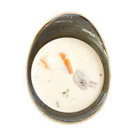 Thai coconut soup with tiger prawns and mushrooms